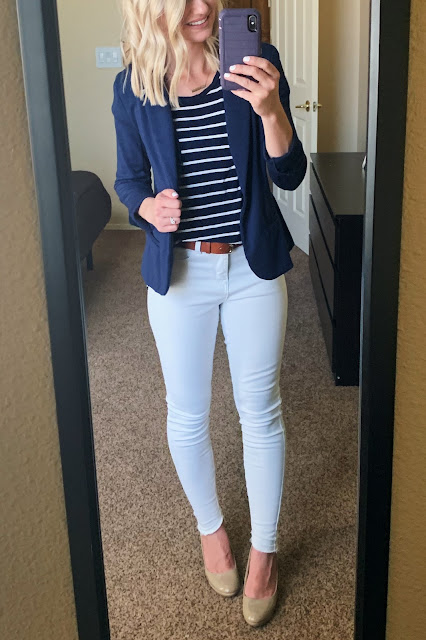 White jeans with a navy striped shirt and navy blazer