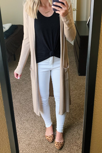 White jeans with a tan duster cardigan