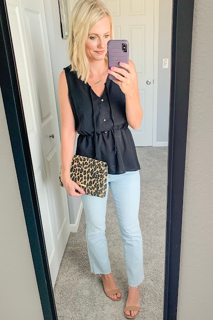 Black peplum top with cropped flair jeans and block sandals