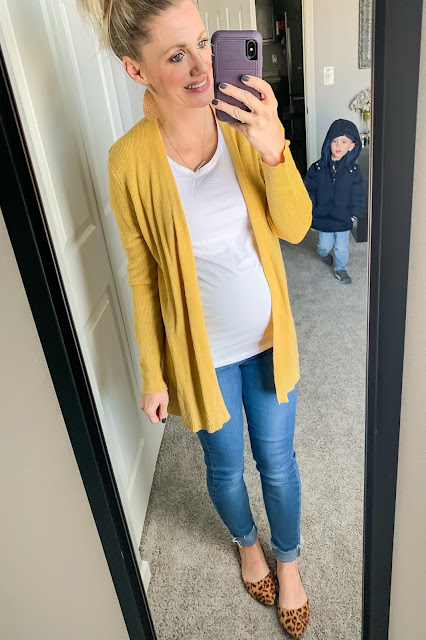 Yellow cardigan with jeans and leopard slip-ons