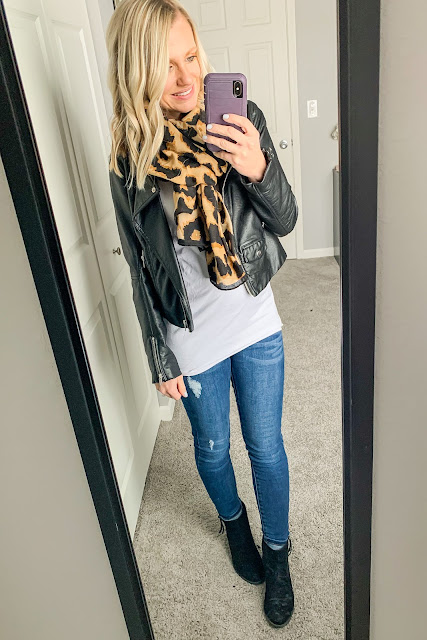 Maternity outfit with a moto jacket