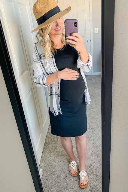 Fitted black maternity dress with button down