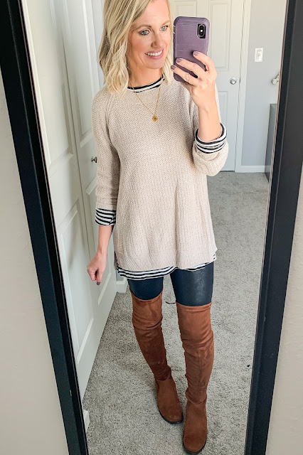 Sweater layered over striped tunic