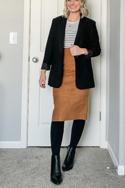Faux suede skirt styled with striped crew neck shirt