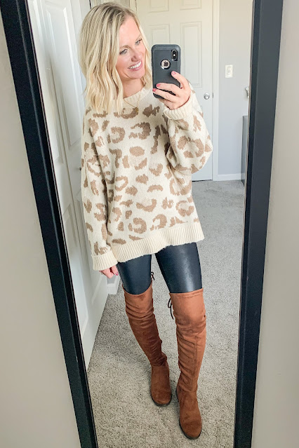 Faux leather leggings with a cozy leopard sweater