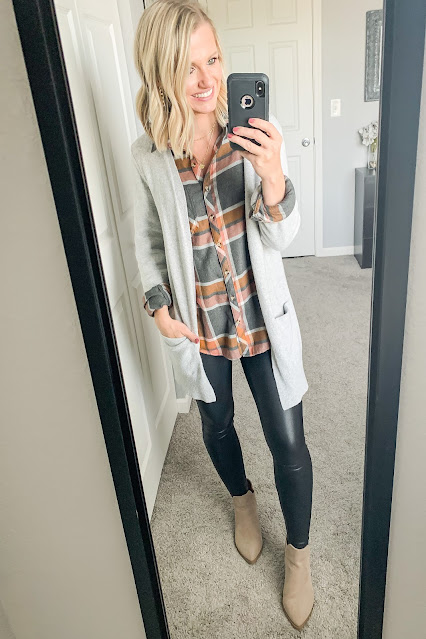 Faux leather leggings with a plaid button down shirt