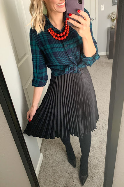 Plaid top and black pleated skirt