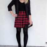 Holiday outfit with a red houndstooth skirt