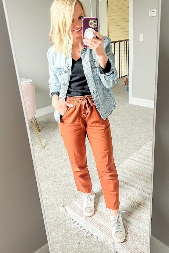 Orange drawstring pants with denim jacket