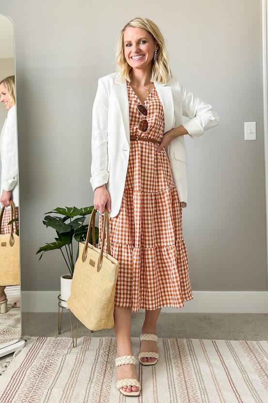 White blazer and orange gingham dress