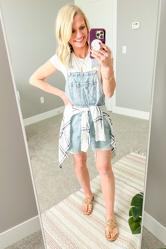Short overalls with a plaid shirt