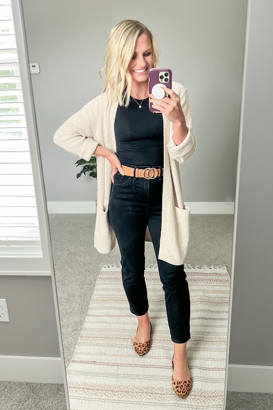 All black outfit with a tan cardigan