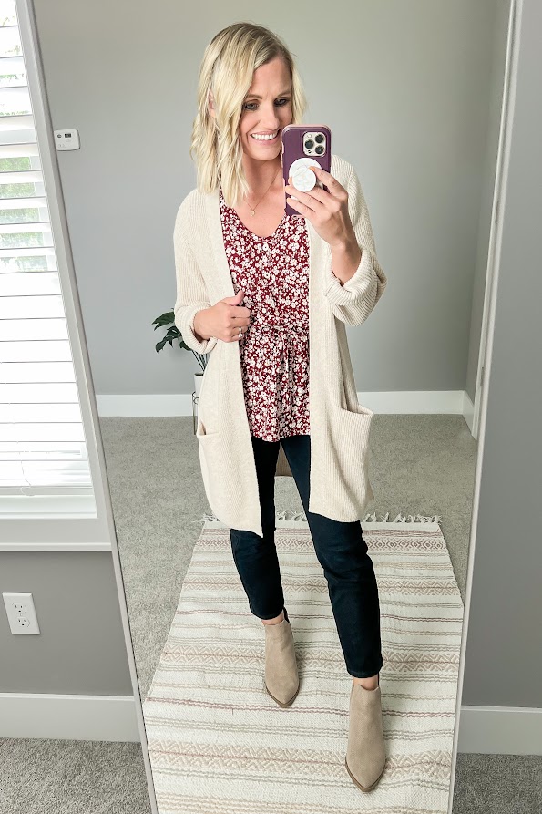 floral top with a cardigan and black jeans