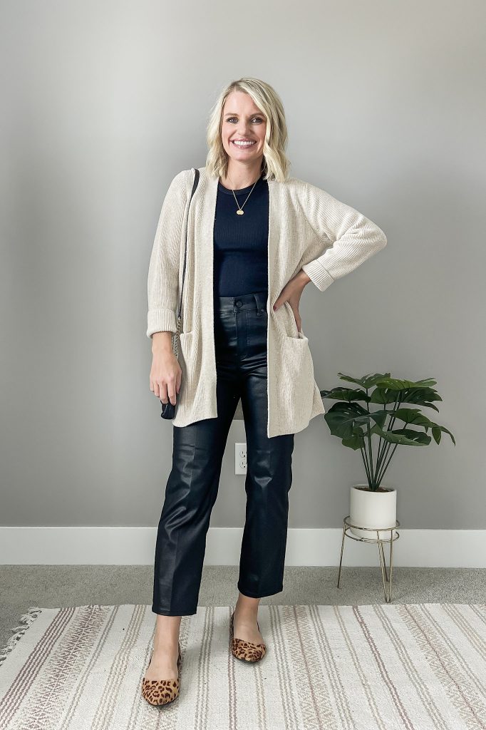 Coated black jeans with cardigan