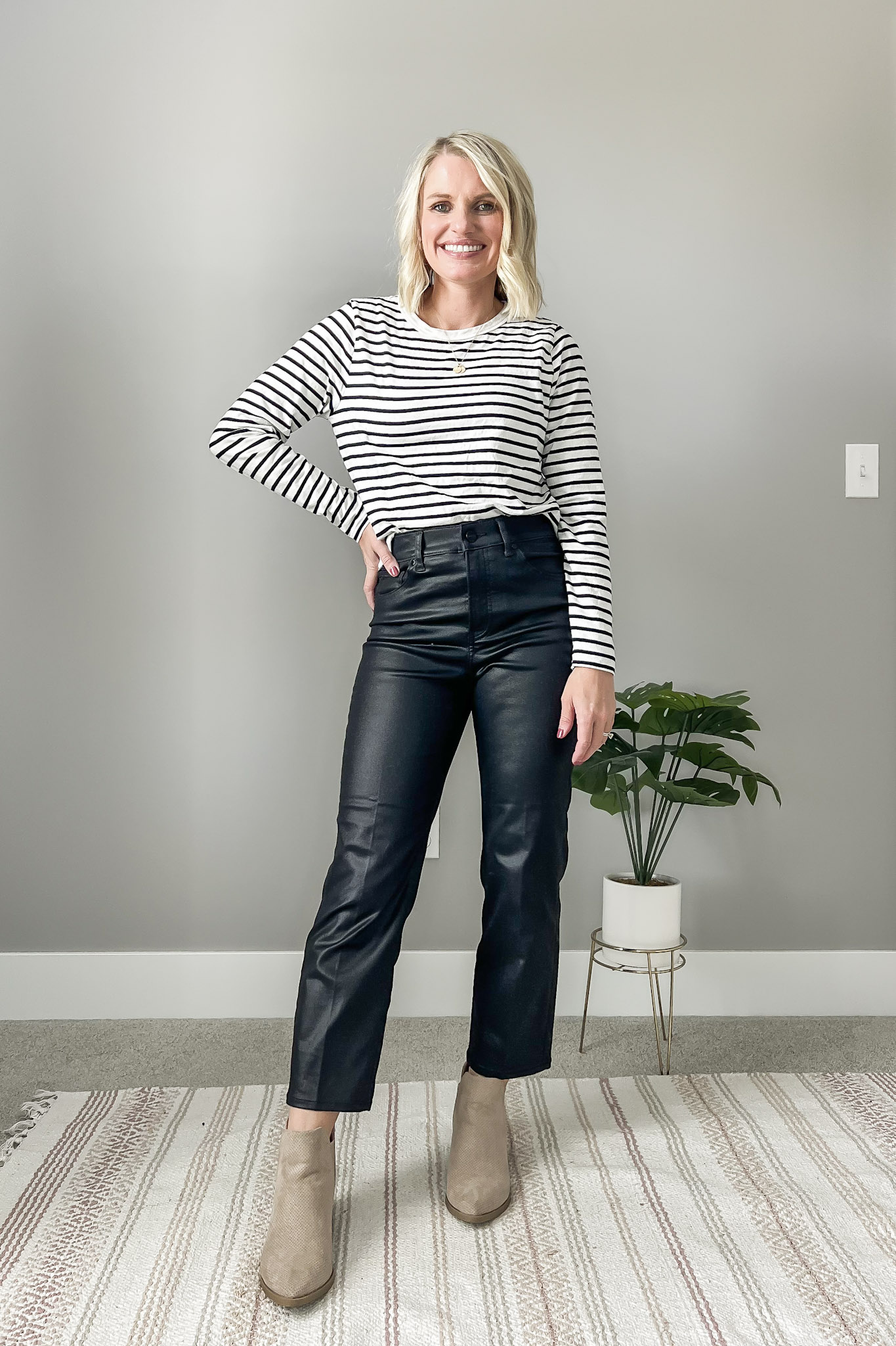Coated black jeans with striped top