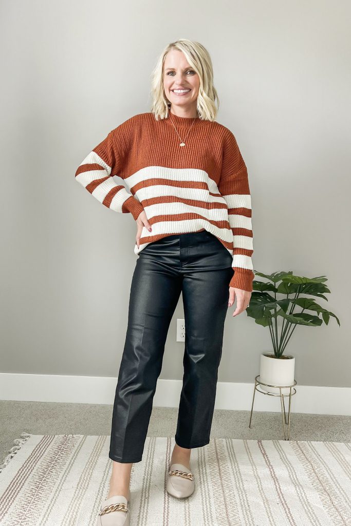 Coated black jeans with sweater