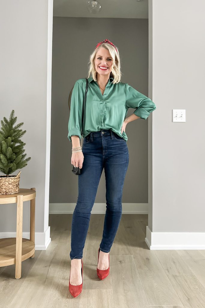 Satin green shirt with skinny jeans and red heels.