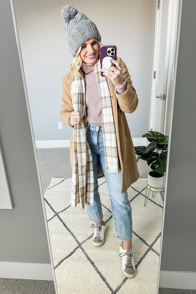 Winter layers with straight-leg jeans and sneakers