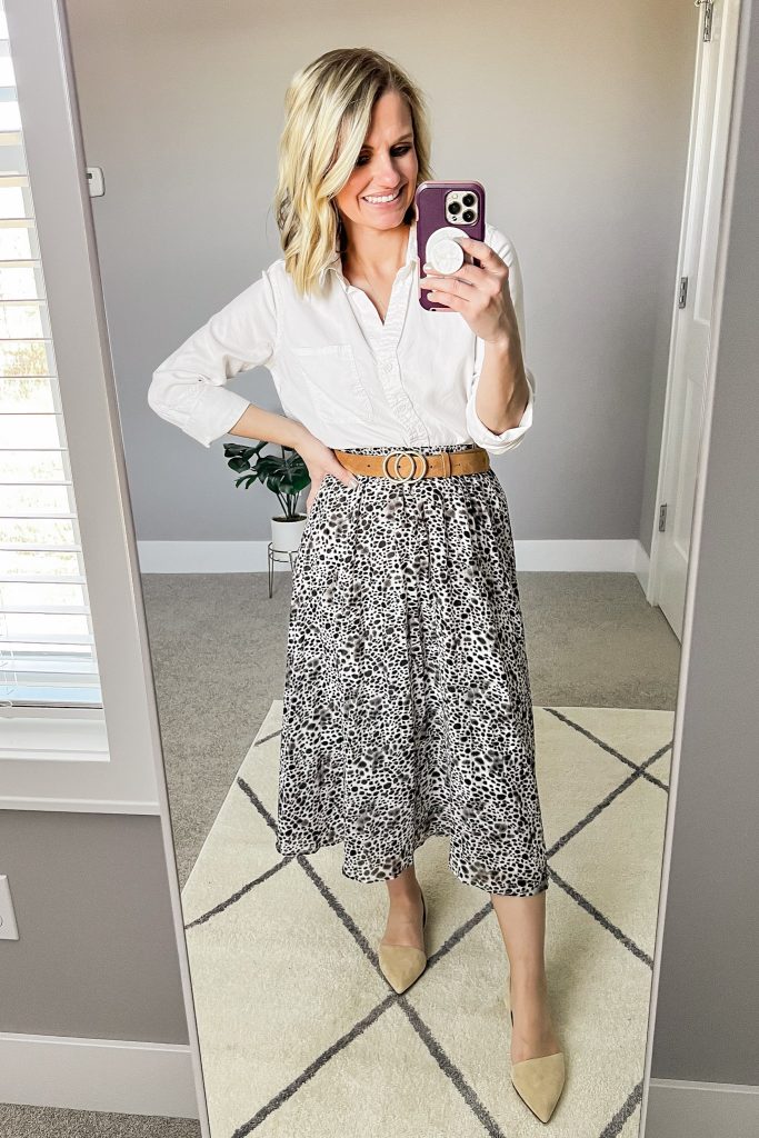 Leopard pleated skirt with a white button-down shirt. 