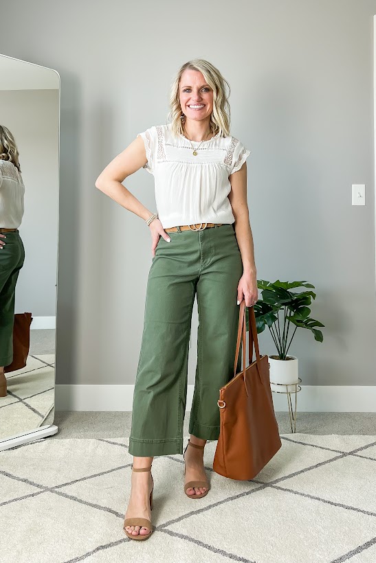 White blouse with olive green pants