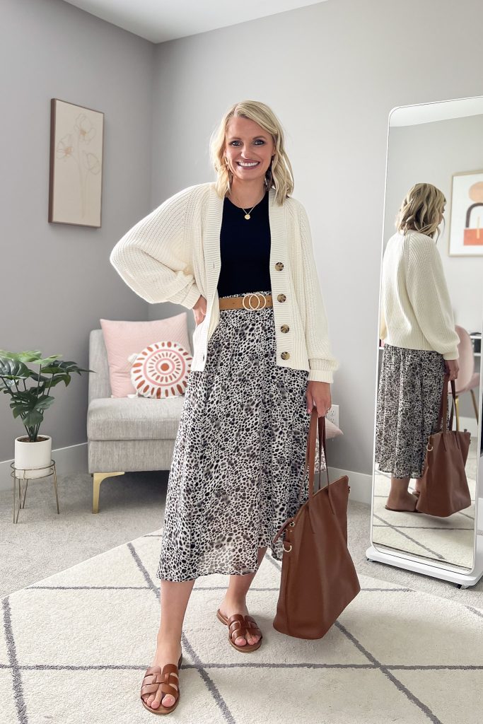 Leopard pleated skirt with a cardigan.