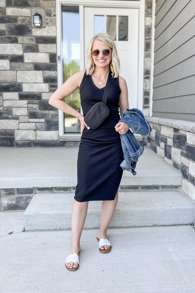 Cute mom outfit with a black midi dress.