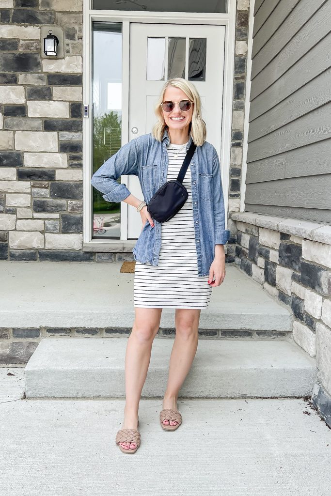 Cute mom outfit with a striped tank dress and a chambray shirt.