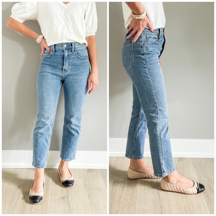 Black toed ballet flats pair with straight-leg jeans.