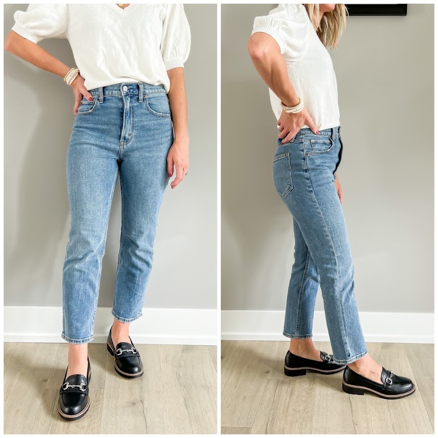 Black loafers paired with straight-leg jeans.