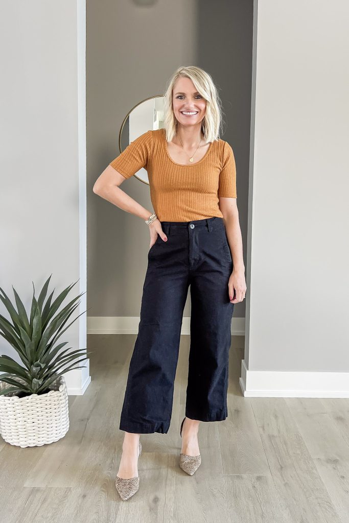 Mustard yellow top with wide leg black pants