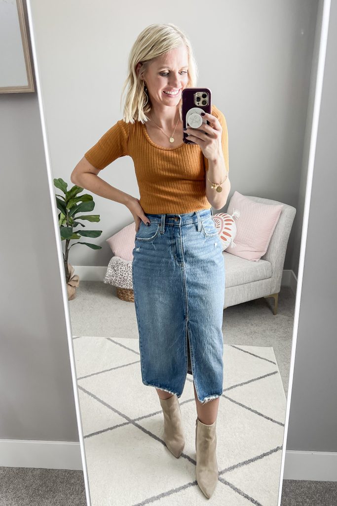 Mustard yellow shirt with denim midi skirt and booties.