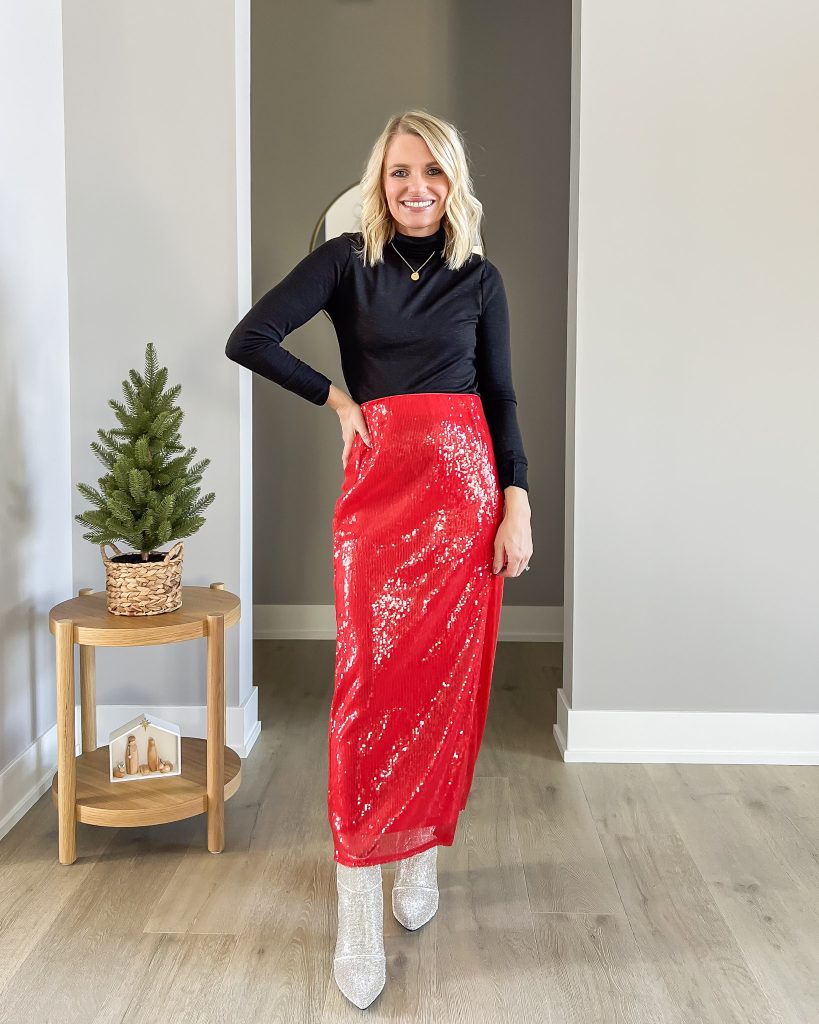 Red sequin skirt with a mock neck top and rhinestone boots