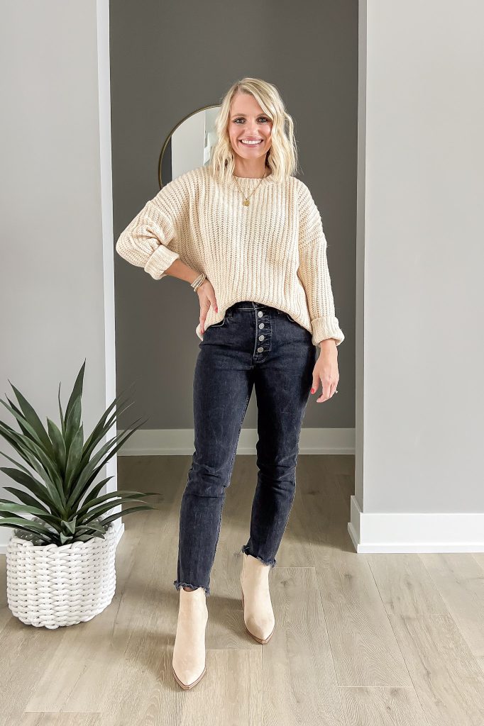 Neutral sweater with black jeans