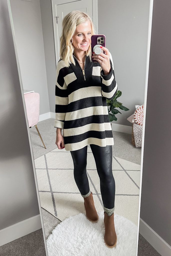 Striped sweater with leggings and brown Chelsea boots.