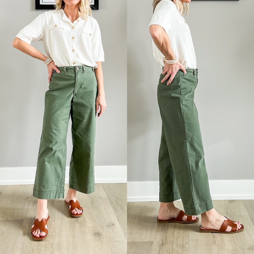 Slide sandals paired with cropped wide-leg pants. 