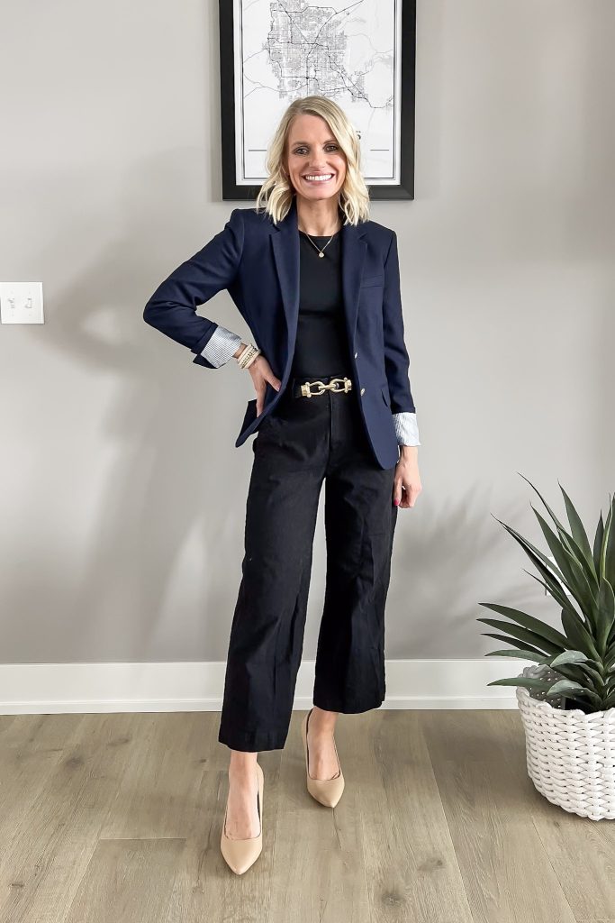 Black top with black wide-leg pants and a Navy blazer.