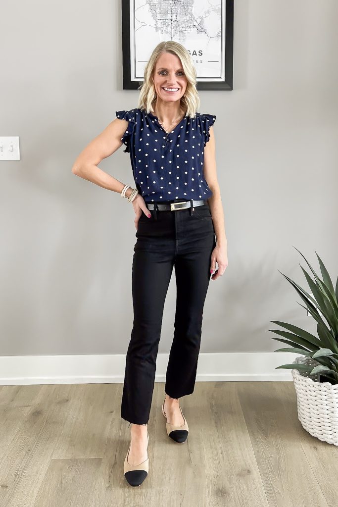 Polka dot navy top with black jeans. 
