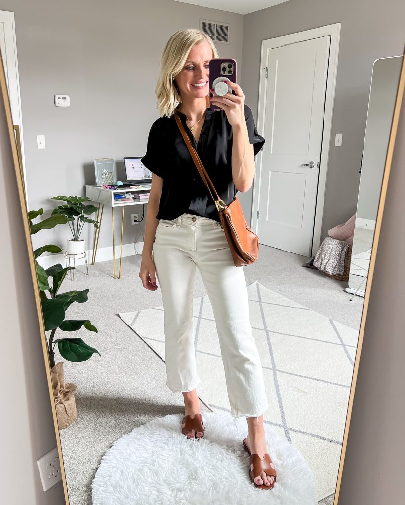 mixing brown and black outfit ideas with white denim, brown sandals and black top