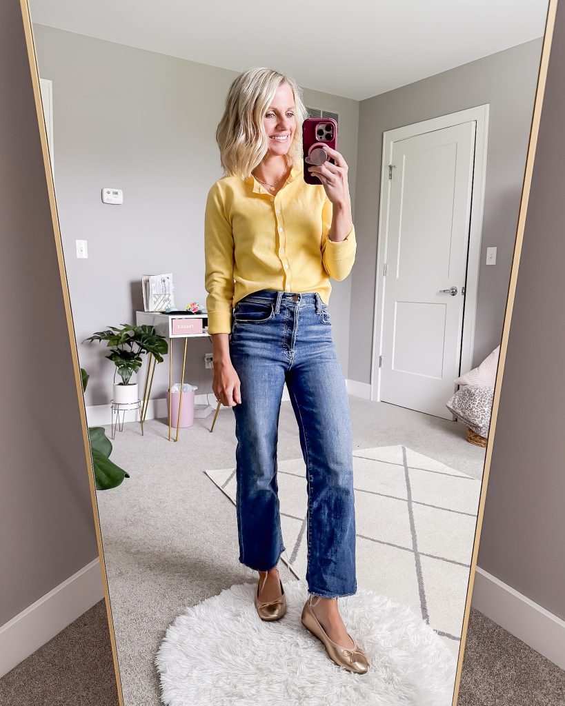 Thrifted Mother jeans paired with a yellow cardigan.