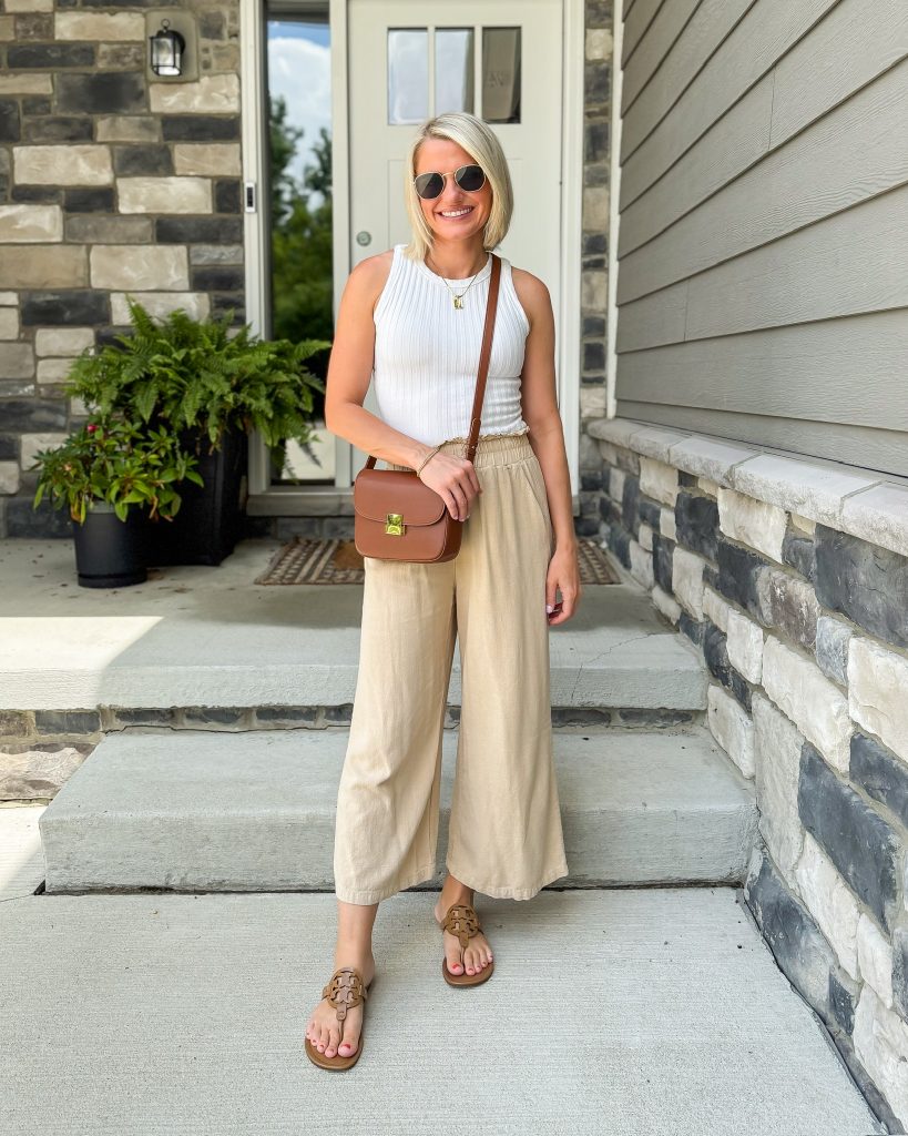 Easy Summer Mom Outfits cropped wide leg pants and white tank top with brown sandals