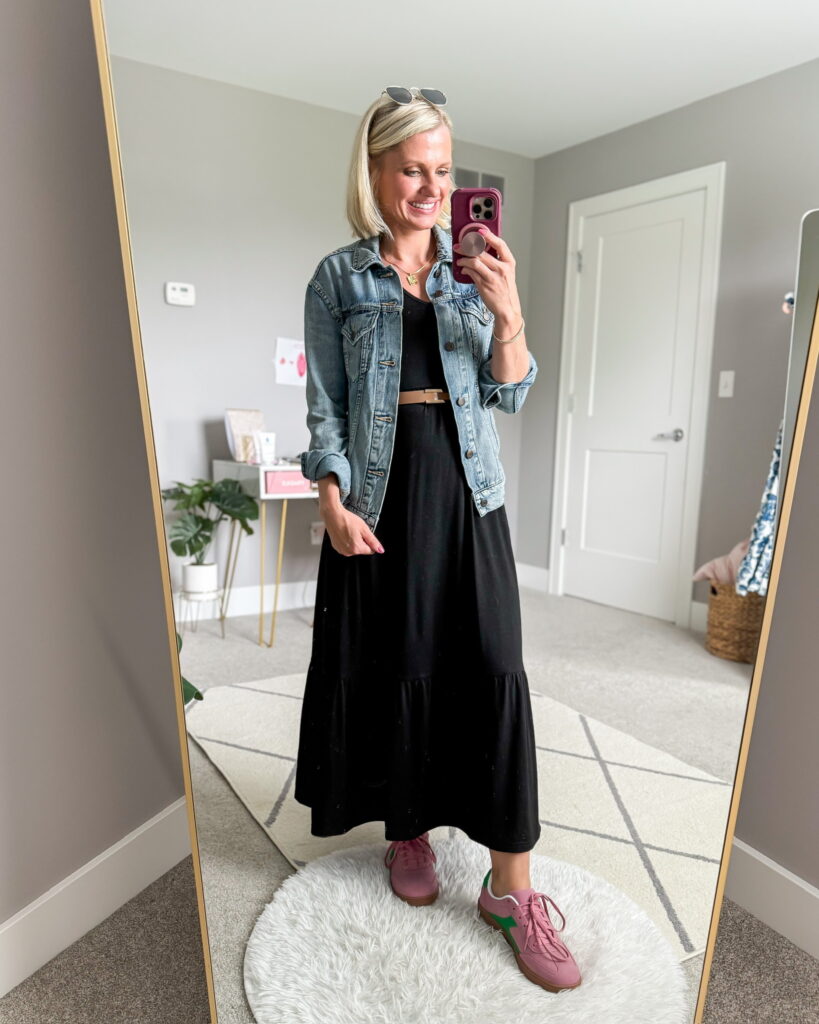 Black dress with a denim jacket and sneakers.