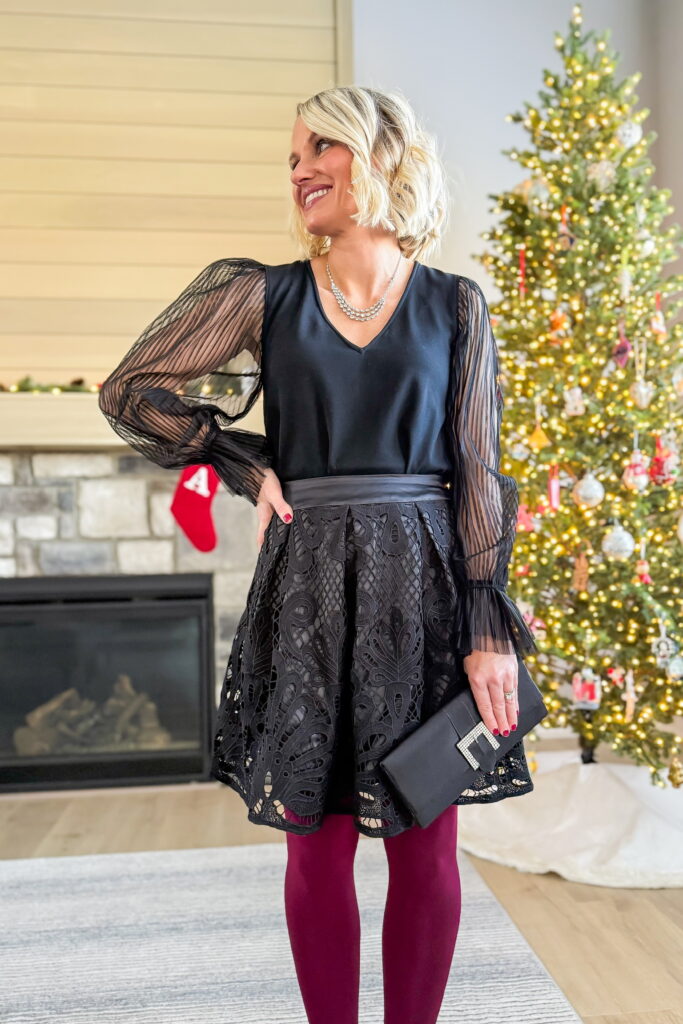 holiday party outfit idea black skirt with colored tights