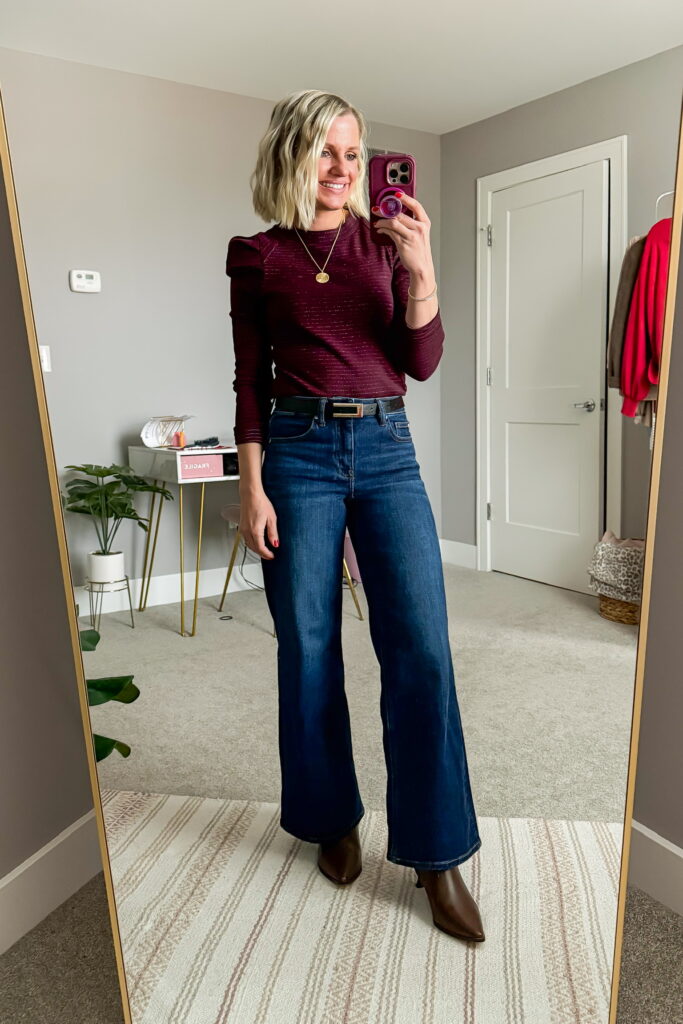 brown heeled boots with flared jeans