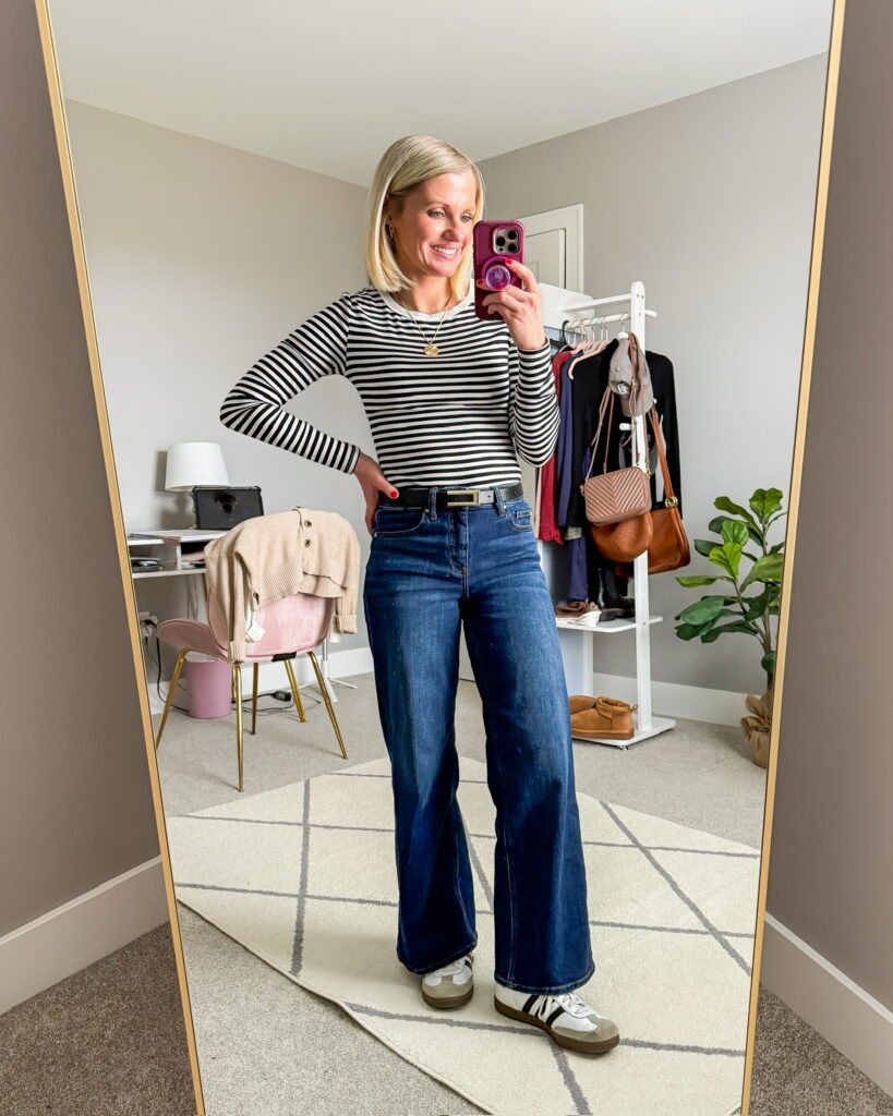 winter outfit idea wide leg jeans with striped long sleeved top