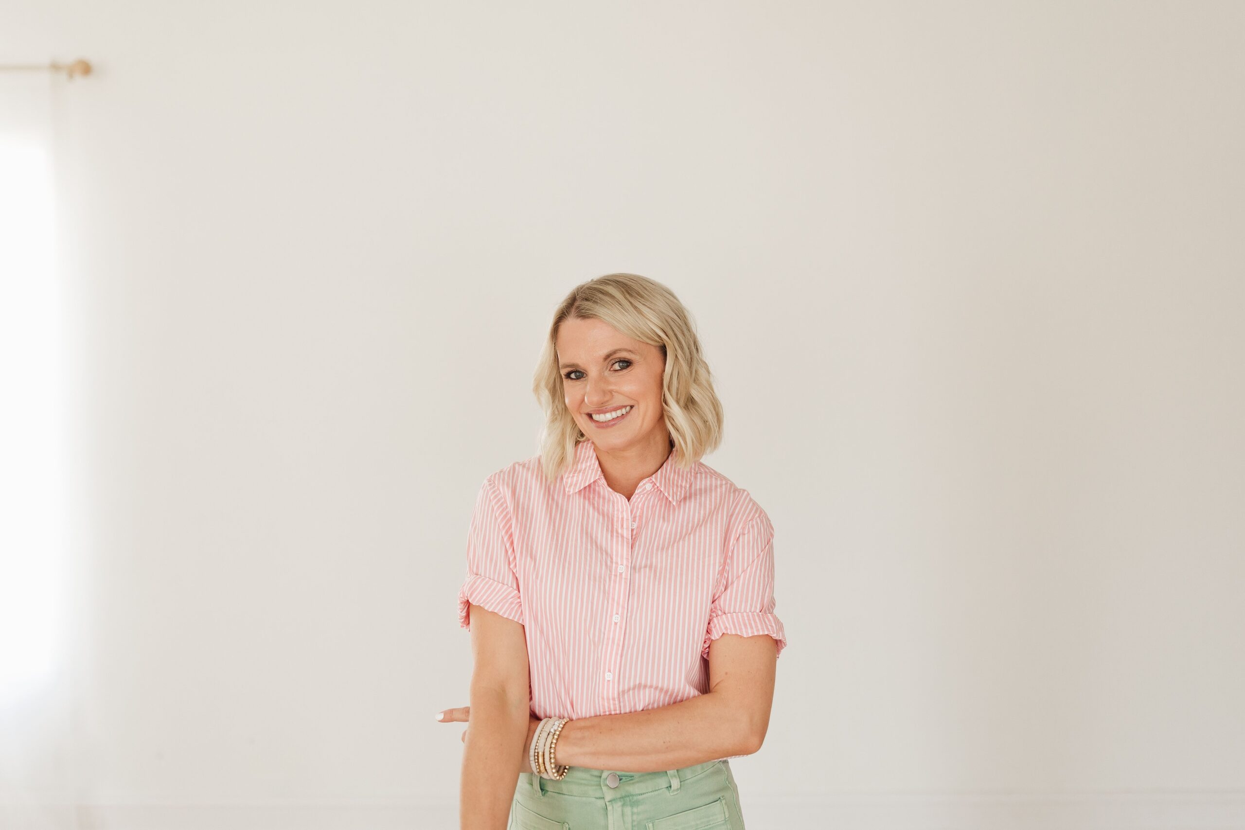 spring business casual outfit with green pants and short sleeved button down