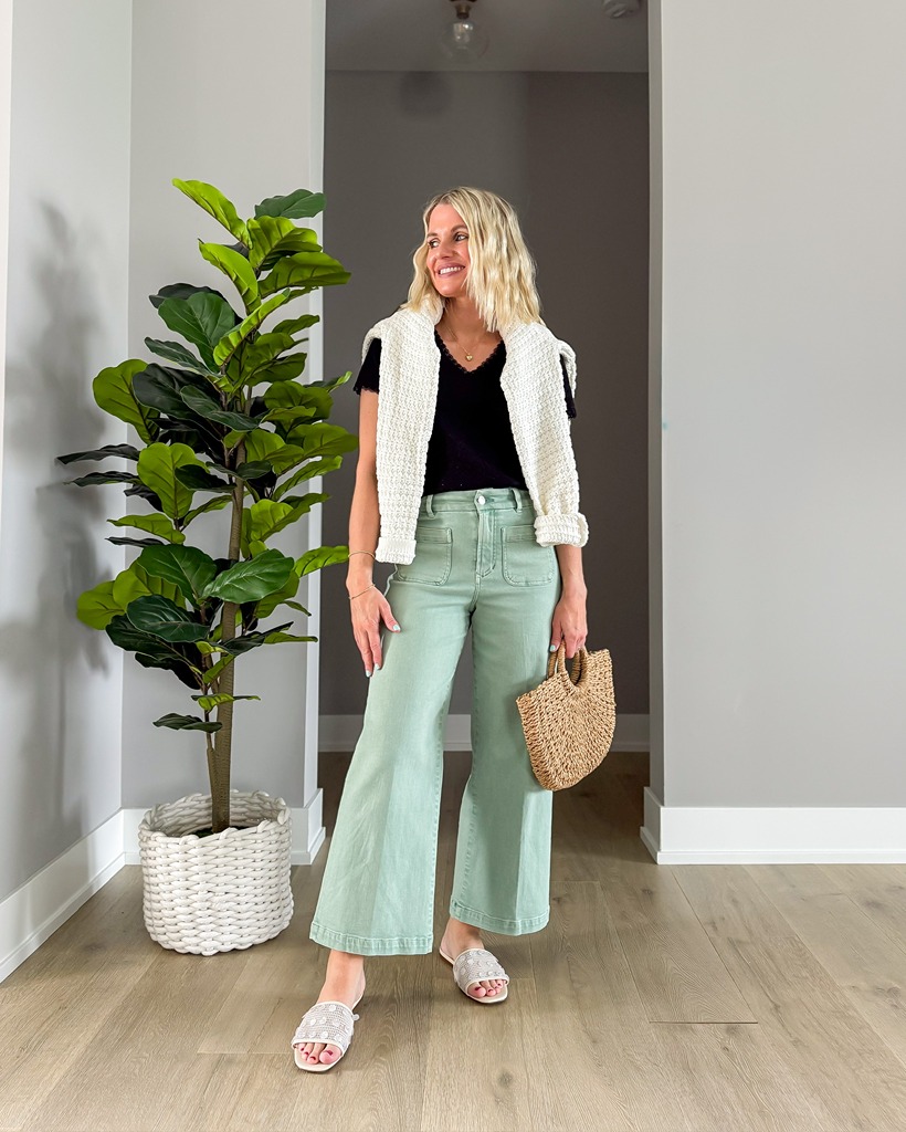 cropped green pants with cardigan over shoulders spring outfit