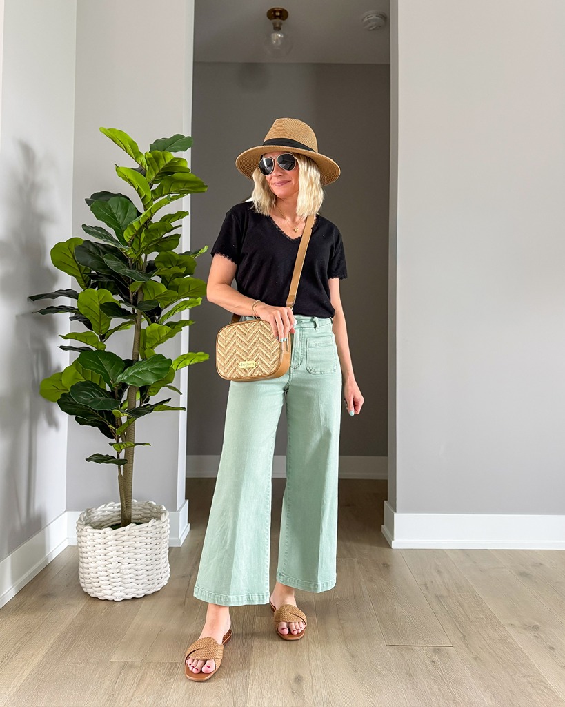 spring capsule wardrobe with green pants and black top