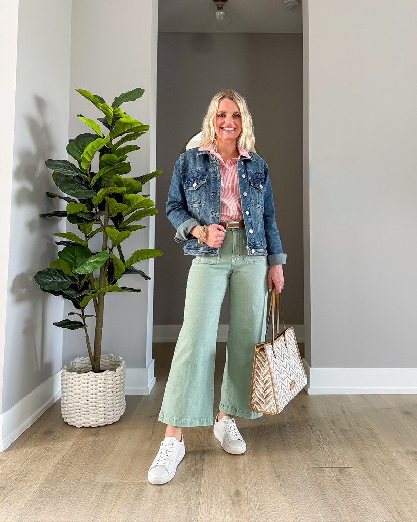spring outfit idea with green pants, pink shirt and denim jacket.