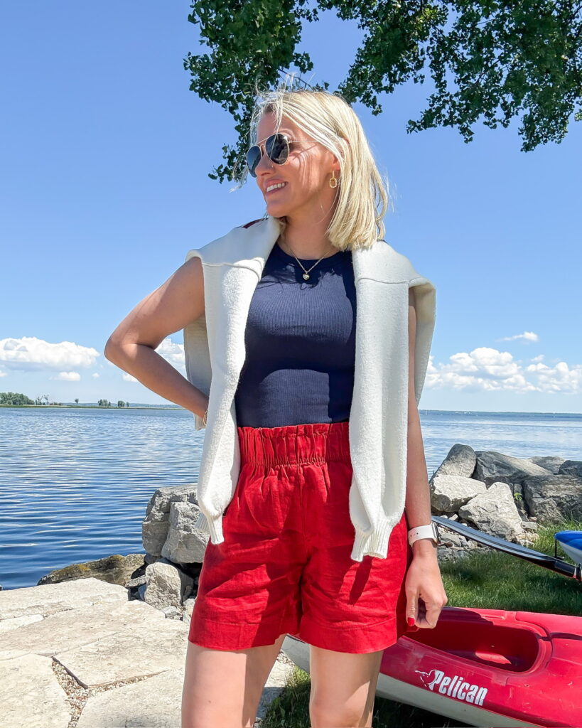 red white and blue summer vacation outfit with sweater